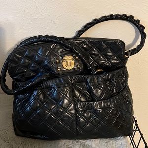 Authentic Marc Jacobs purse. Immaculate inside and out. Black quilted pattern.